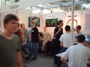 Debian booth with Alex and Christian having no ...